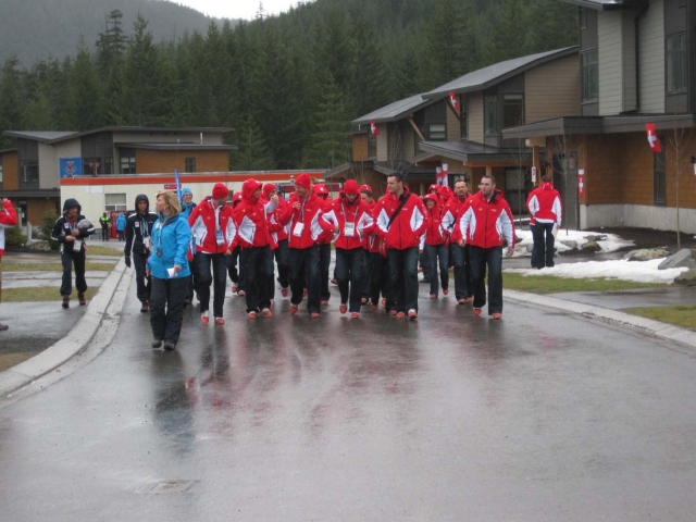 Alpine ski team on their way to the Opening Ceremonies